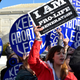 A pro-life woman clashing with a group of pro-choice demonstrators at the U.S. Supreme Court in 2015